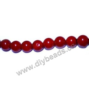Bead, red coral (imitation), 7mm round. Sold per 15-inch strand.