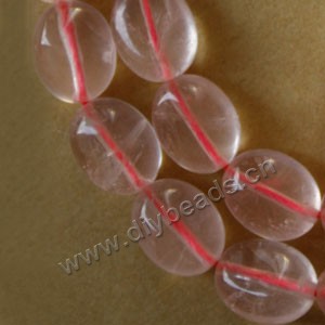 Bead, rose quartz (natural), 12x8mm flat oval, Mohs hardness 7. Sold per 15-inch strand