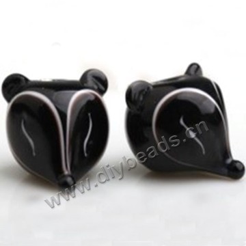 Bead,lampworked glass,black with white fox head, 16mm;20mm. Sold per pkg of 5.