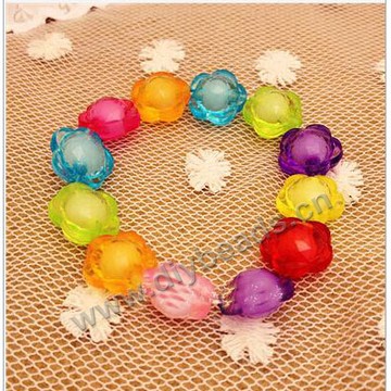 Children's bracelet, flowers and lovely colorful acrylic children bracelet for wholesale. Sold per pkg of 1 pc.