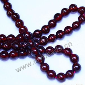 Bead, garnet (natural), 7mm round, A grade, Mohs hardness 7 to 7-1/2. Sold per 16-inch strand