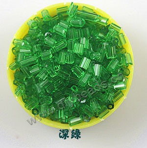 Bugle bead, glass,transparent crystal,green ,#1(2x2mm) beads. Sold per pkg of 80 grams,approximately 4,500ps.