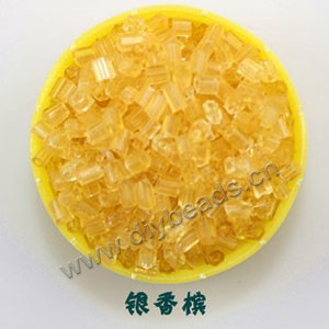 Bugle bead, glass,transparent crystal,dark yellow ,#1(2x2mm) beads. Sold per pkg of 80 grams,approximately 4,500ps.