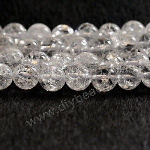 Bead, ice flake quartz (heated), 12mm round. Sold per 15-inch strand