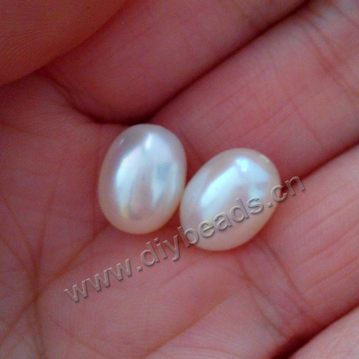   Pearl  rice shape pearl , AAA grade , cultured freshwater,   white, 9---10mm. Sold by pairs
