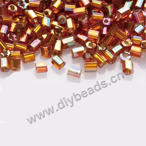 Bugle bead,taiwan, glass, silver-lined  rainbow ,honey,#1(2x2mm) hex beads. Sold per pkg of 500 grams,approximately 40000ps 