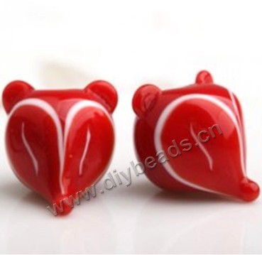 Bead,lampworked glass,red with white fox head, 16mm;20mm. Sold per pkg of 5.