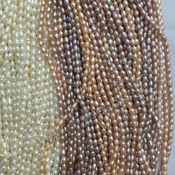 Pearl, cultured freshwater pearl,white pink and purple ,3mm rice, AAA grade. Sold per bag of one strand