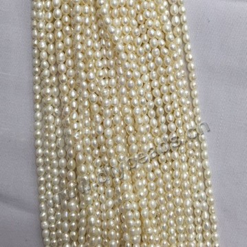 Pearl, cultured freshwater pearl,white ,3mm rice, AA grade. Sold per bag of one strand