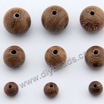 Beads,wood,round,12mm. Sold per pkg of 100ps