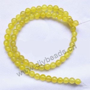 Bead, yellow agate (dyed), 6mm round. Sold per 15-inch strand