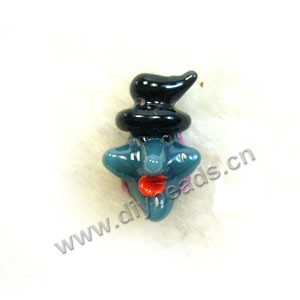Bead, lampworked glass, opaque blue,black,pink, 20x12.8mm ghost with 2.4mm hole. Sold per pkg of 4.