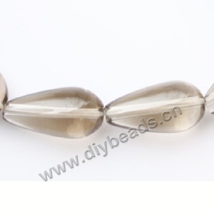Bead, smoky quartz (heated/irradiated), light, 11x28mm puffed teardrop.sold per pkg of 12