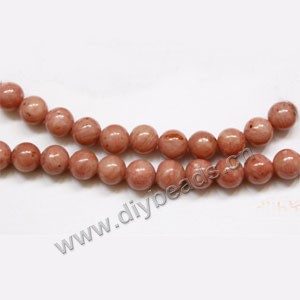 Bead, rhodonite (natural), 6mm round. Sold per 15-inch strand