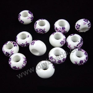 Bead, decal porcelain, white and blue, 15x10mm rondelle with flower,5-6mm hole. Sold per pkg of 12.
