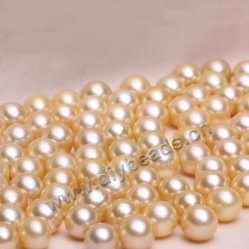 South Sea Pearl, natural light gold color, 9-10mm with half-drilled hole. Sold per pkg 1 pearl