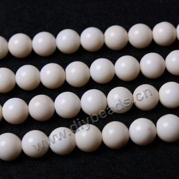 Bead, natural white coral, 10mm round. Sold per 15-inch strand.