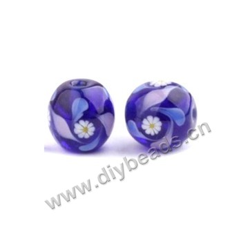 Bead, lampworked glass,purple with flower, 16x16mm round.mini order 50pc 