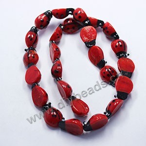 Bead, lampworked glass, red, 15x20x9mm ladybug with eyes. Sold per pkg of approximately 120 beads.