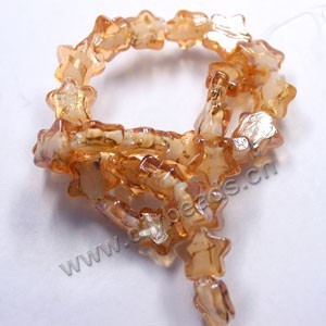 Bead, lampworked glass, brown ,15x15mm flat star. Sold per pkg of 500.