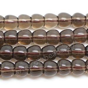 Bead, smoky quartz (heated/irradiated), 8x9mm carved apple. Sold per 16-inch strand.