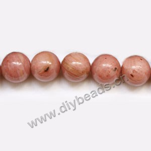 Bead, rhodonite (natural), 10mm round. Sold per 15-inch strand