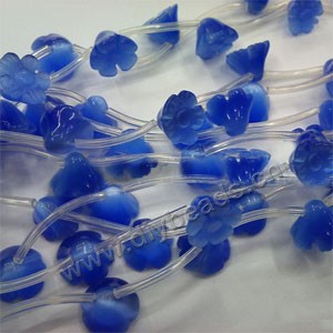 Bead, cat's eye glass, blue, 9x12mm carved flower. Sold per 16-inch strand.approximately 8 beads.
