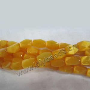 Bead, cat's eye glass,yellow, 17x14mm faceted nugget, Sold (5) 14.5-inch strands.