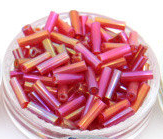 Bugle bead, glass, red ,#3(6x2mm) bugle tube. Sold per pkg of 300 grams, approximately 9,000ps