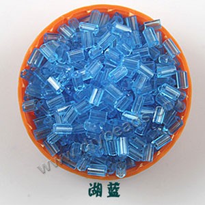 Bugle bead, glass,transparent crystal,turquoise blue ,#1(2x2mm) beads. Sold per pkg of 80 grams,approximately 4,500ps.