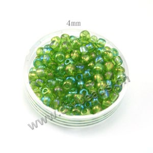 seed bead,glass,rainbow green,#6 round,sold per pkg of 50g, approximately 550ps