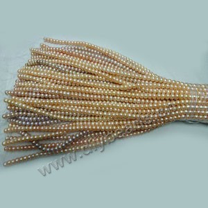 Pearl mix, cultured freshwater pearl ,white / peach / mauve, 9-10mm button,A grade. Sold per pkg of (10) 15-inch strands.
