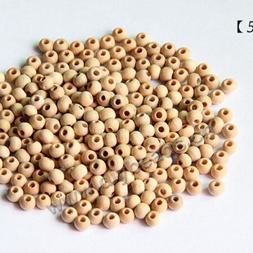 Beads,wood,round loose beads,5mm with 3mm hole. Sold per pkg of 1000ps