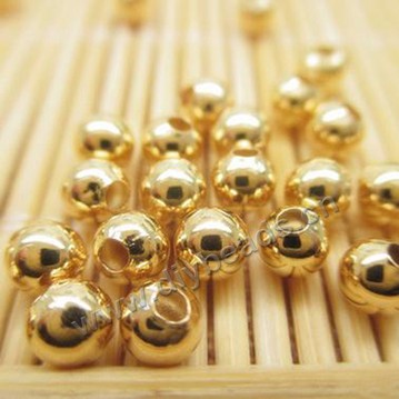 Bead,24k gold filled,4mm,round with metal, Sold per pkg of 100 pieces.