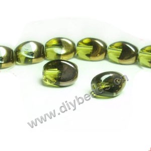 Bead ,copper-plated glass, lime green, 13x10mm twisted oval. Sold per pkg of ten 30cm strand.