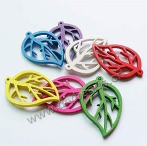 Focal,wood,assorted colors, 43x28mm double side hollow leaf. Sold per pkg of 100.