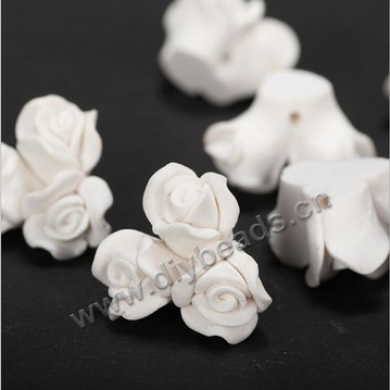 Bead, polymer clay,white,20x12mm flower. Sold per pkg of 5.