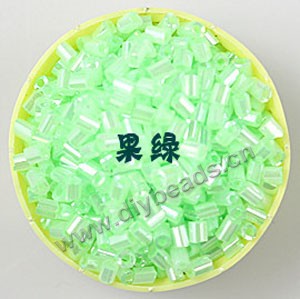 Bugle bead, glass,silky luster,light green,#1 (3x2mm)beads. Sold per pkg of 80 grams,approximately 4,500ps.