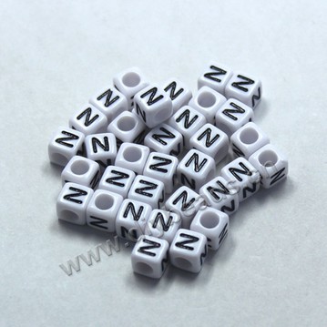 Bead, acrylic,White,alphabet is N, 6x6mm cube with 3.5mm drill hole. Sold per pkg of 100ps