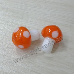 Bead, lampworked glass, orange and white, 10x12mm mushroom with spots. Sold per pkg of 20 beads.