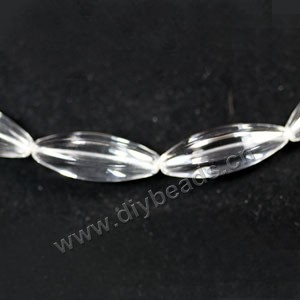 Bead,clear quartz crystal (natural), 10x28mm corrugated oval . Sold per 16-inch strand