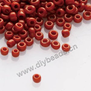 seed bead,glass,opaque dark red,#15 irregular round,sold per pkg of 30g, approximately 6000ps. 
