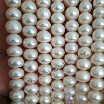 Pearl, cultured freshwater, white,peach, mauve, ,button pearl  ,10-11 mm all light, Sold per bag of one strand