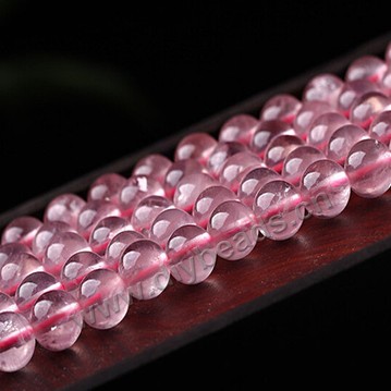 Bead,rose quartz,  12 mm round . Sold by strands