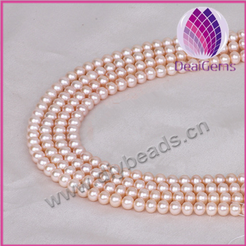 7-8mm, round,cultured freshwater,pink,half hole, AAAgrade. Sold per pkg of 1 strand