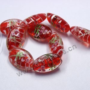 Bead, lampworked glass,clear/red/pink, 26x18mm puffed oval with painted flower and silver swirls. Sold per pkg of 300.