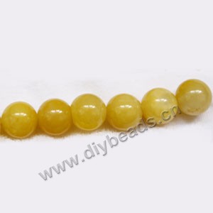 Bead, yellow "jade" (natural), 10mm round. Sold per 15-inch strand