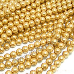 Bead, glass pearl, golden, 6mm round. Sold per pkg of two 16-inch strands.
