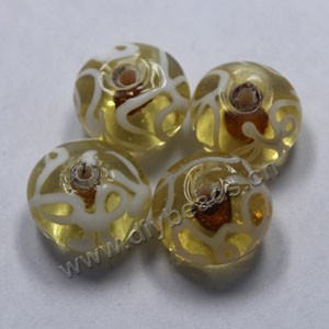 Bead,lampworked glass, clear and white with gold-colored foil painted swirls, 16x10mm rondelle. Sold per pkg of 500.
