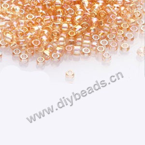 #11 seed beads,glass,cream soda,rainbow,irregular round.sold per pkg of 1/2 kilo.